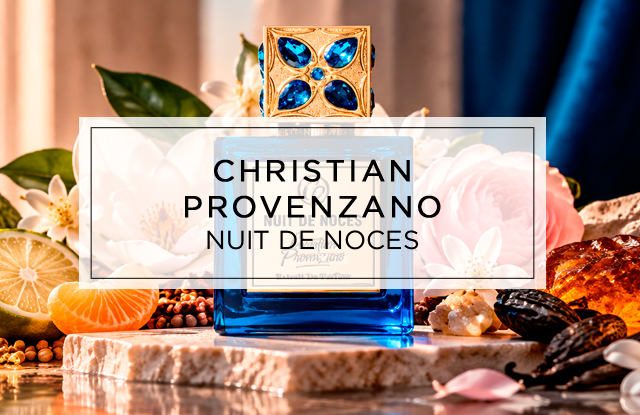 Blauer Parfumflakon „Nuit de Noces“ von Christian Provenzano mit goldverziertem Verschluss, umgeben von weißen und rosafarbenen Blüten, Zitrusfrüchten, Vanilleschoten und Harzen in einer luxuriösen, sonnendurchfluteten Kulisse.